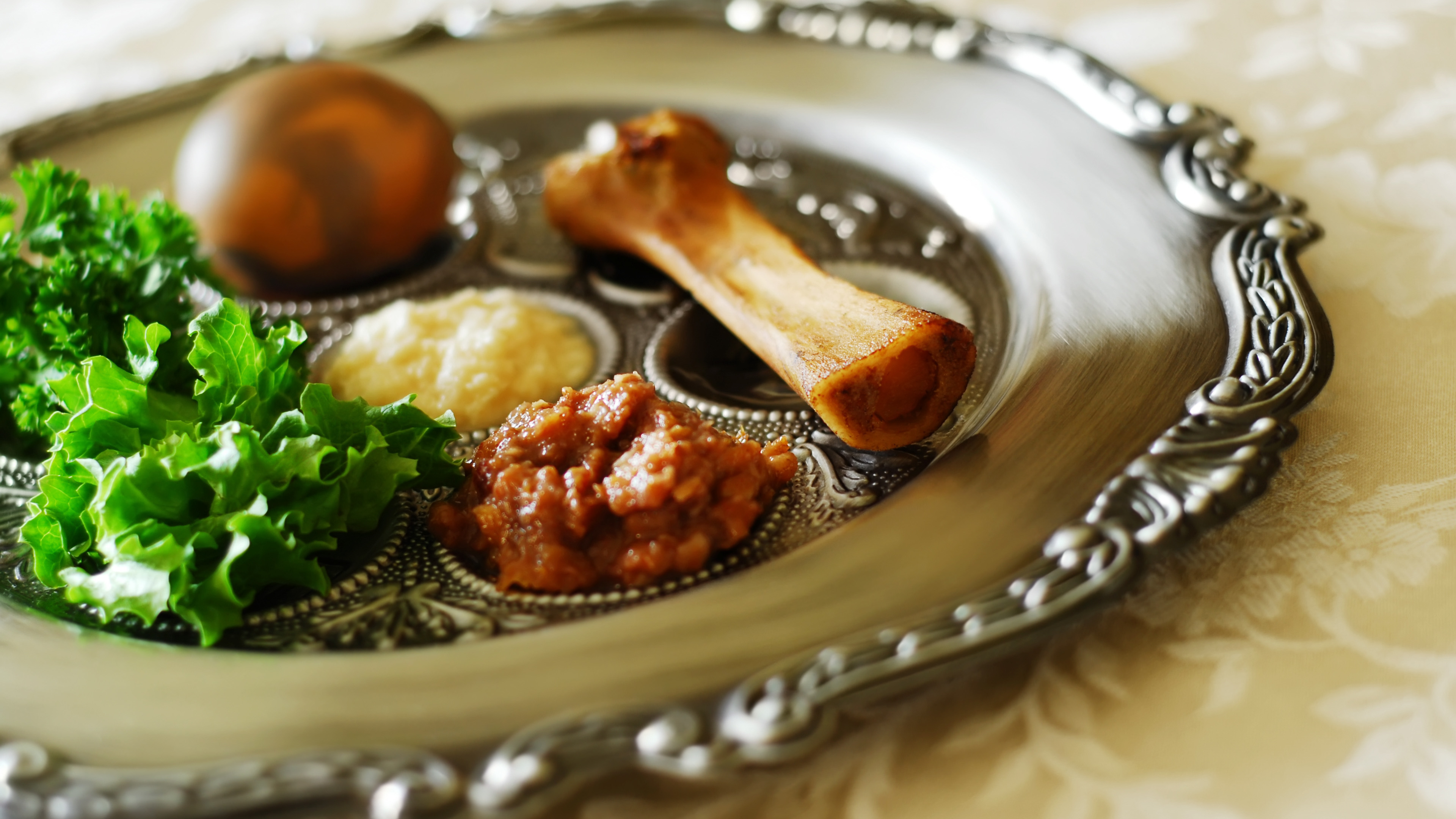 Traditional symbols on a seder plate for the Jewish festival of Passover